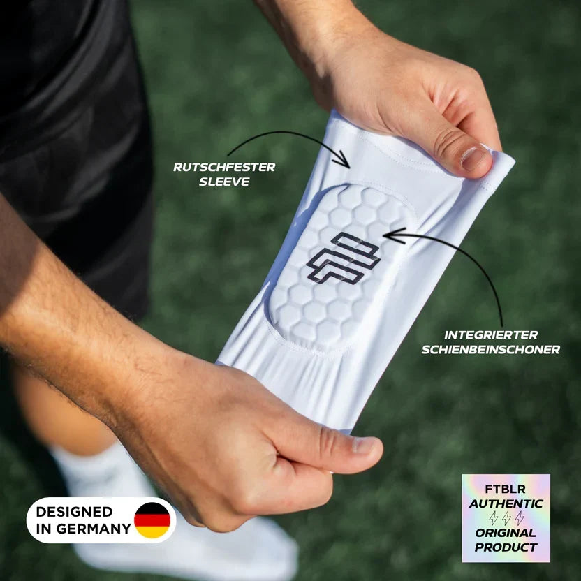 Protectores de piernas de fútbol con patrón de panal anticolisión para deportes al aire libre-ES