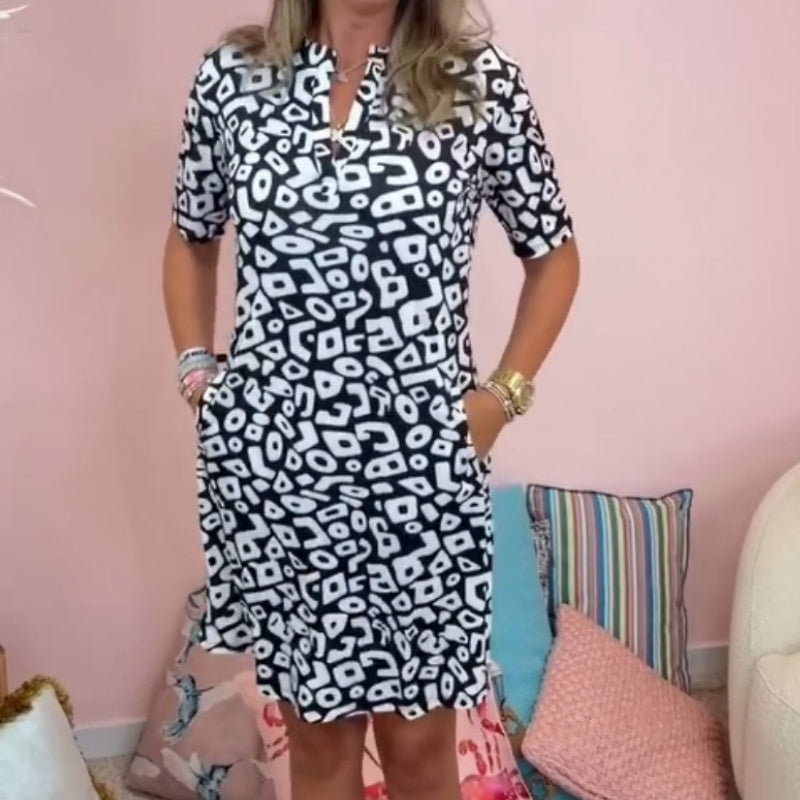 Suknelė trumpomis rankovėmis su V formos iškirpte-ES