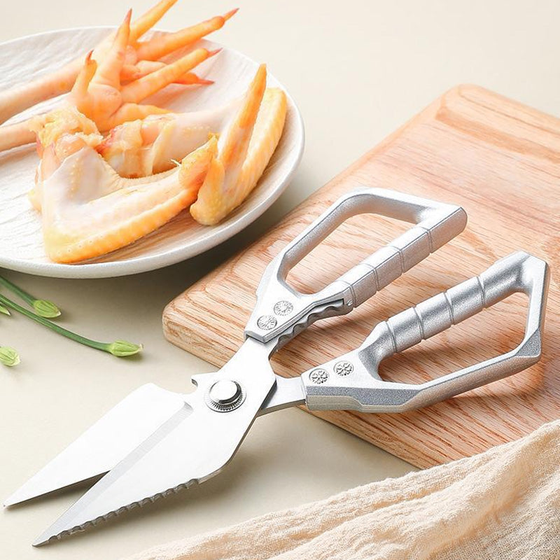 Tijeras de cocina multifuncionales y duraderas.-ES